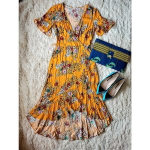 Yellow sun dress with slight high-low hem